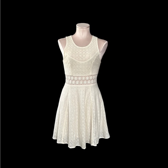 Free People ivory dress in size 0. See through design on waist. - Picture 1 of 12